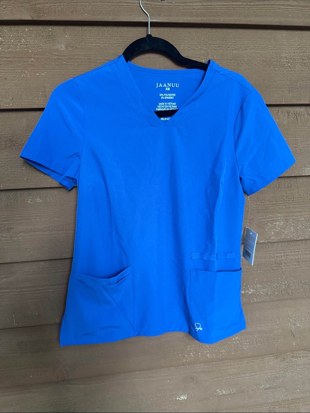 Jaanuu V-Neck Scrub Top in Royal Blue size XS